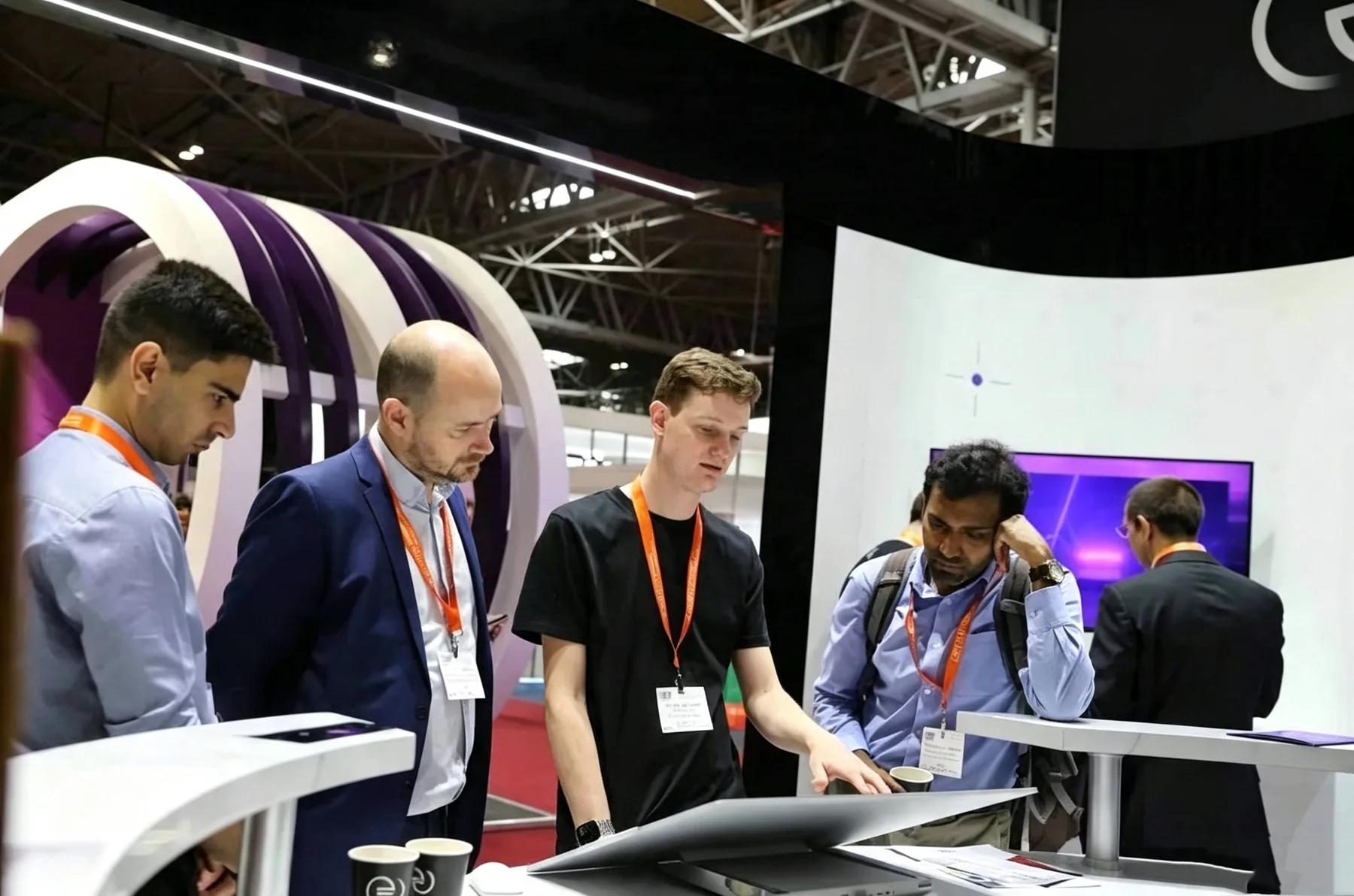 Business discussion at an electronics exhibition